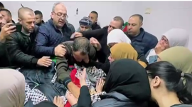 والد ووالدة الشهيدين.PNG