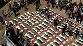 غزة تنظم أكبر جنازة لتشييع 120 شهيداً من عائلتي الحساينة وأبو شريعة (7).jpeg