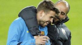 بيكي ومدرب برشلونة