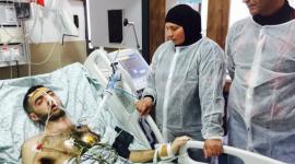 جعفر عوض ووالديه قبيل استشهاده