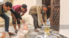  توزيع المساعدات الغذائية (26).JPG