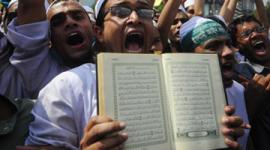 مظاهرة تنديداً بتدنيس المصحف