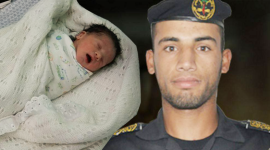 الشهيد احمد أبو عرمانة وابنته حياة التي انجبت في اليوم التالي من استشهاده