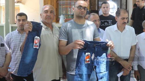 جمعية تجار الملابس في غزة تنظم وقفة احتجاجية رفضاً لقرار وزارة الاقتصاد فرض رسوم إضافية على الملابس المستوردة  (6).JPG