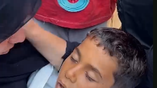 وداع الطفل الشهيد.PNG