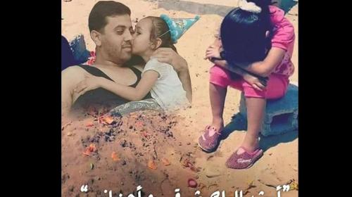الشهيد محمد حمادة وطفلته ريتاج.JPG