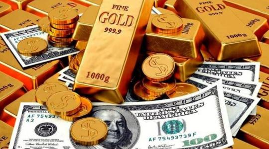الدولار والذهب.jpg
