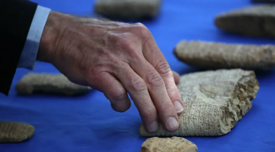 إعادة 18 ألف قطعة أثرية مهربة إلى العراق