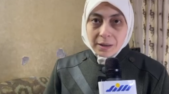 والدة الاسير اسامة الطويل.PNG