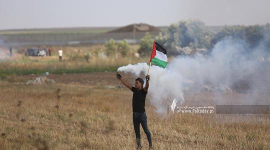 الاحتلال يقمع مسيرة العلم الفلسطيني شرق مدينة غزة (32).JPG