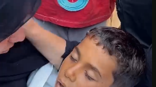 وداع الطفل الشهيد.PNG