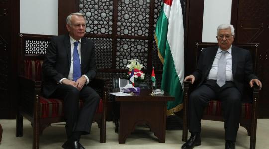 الرئيس محمود عباس ووزير الخارجية الفلرنسي