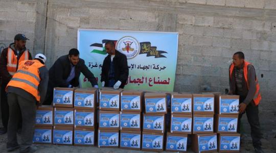 "الجهاد" تنظم حملة توزيع طرود غذائية 