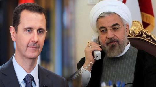 الرئيس السوري بشار الأسد ونظيره الإيراني حسن روحاني