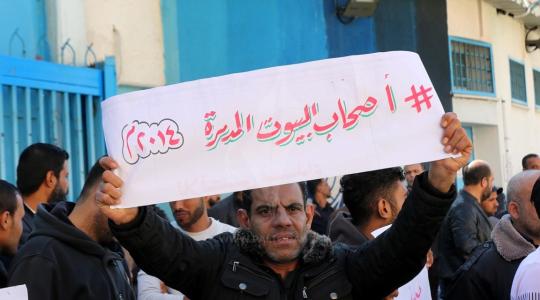 أصحاب المنازل المدمرة بغزة يشاركون في مظاهرة  (20)