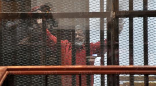 اول ظهور لمرسي بالبدلة الحمراء