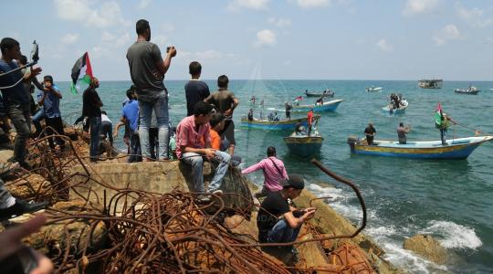 صورة من انطلاق قوافل الحرية وكسر الحصار من ميناء غزة ‫(42598938)‬ ‫‬.JPG