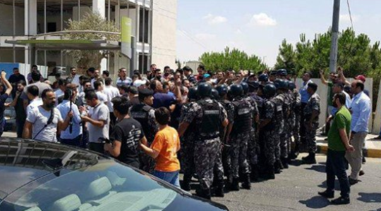 الامن الاردني يقمع مسيرة