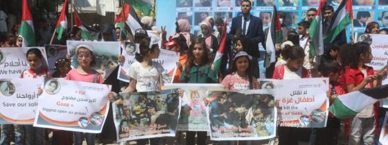 بالصور :فعالية للأطفال لمركز حماية لحقوق الإنسان بعنوان : أنقذوا أطفال غزة