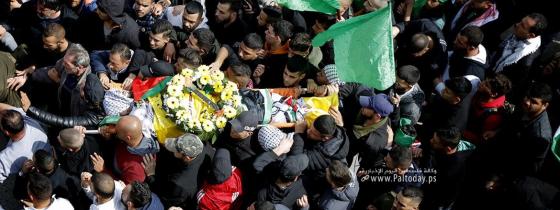 بالصور: تشييع جثمان الشهيد نهاد البرغوثي 20 عاما لمثواه الأخير في قرية كفر عين قرب رام الله