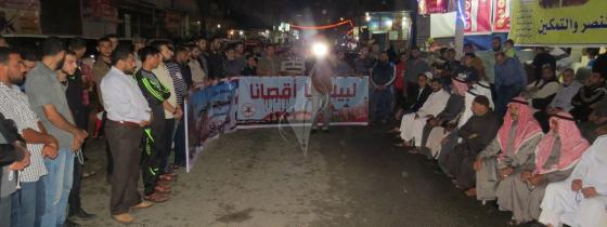 بالصور:الجهاد تنظم وقفة في ذكرى الشقاقي أمام منزله برفح