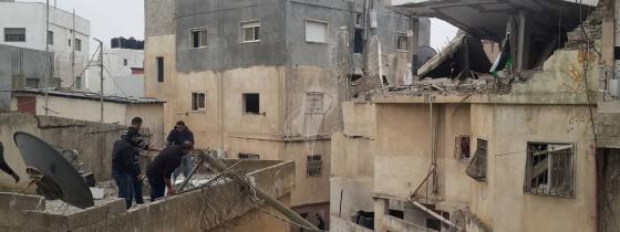بالصور:قوات الاحتلال تهدم منزل الاسير محمد ابو شاهين في مخيم قلنديا شمال القدس المحتلة