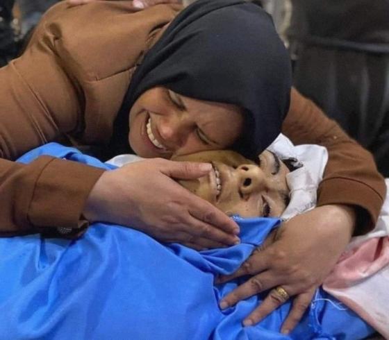 وداع ام خليل حمادة.jpg