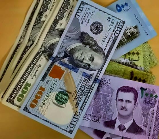 الدولار الأمريكي مقابل الليرة السورية.jpg