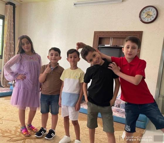ابناء الشهيد واطفال عارضة.jpg