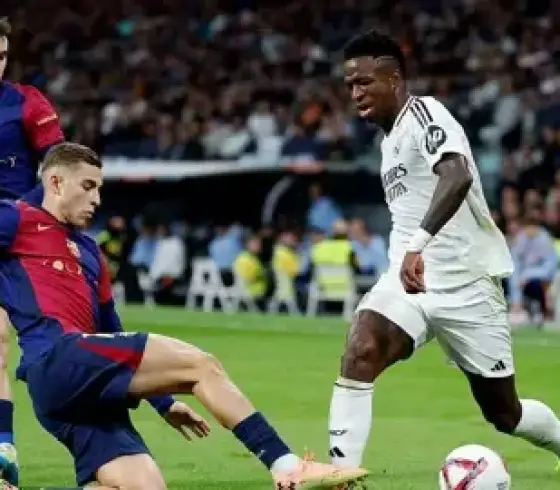 لاعبو ريال مدريد وبرشلونة