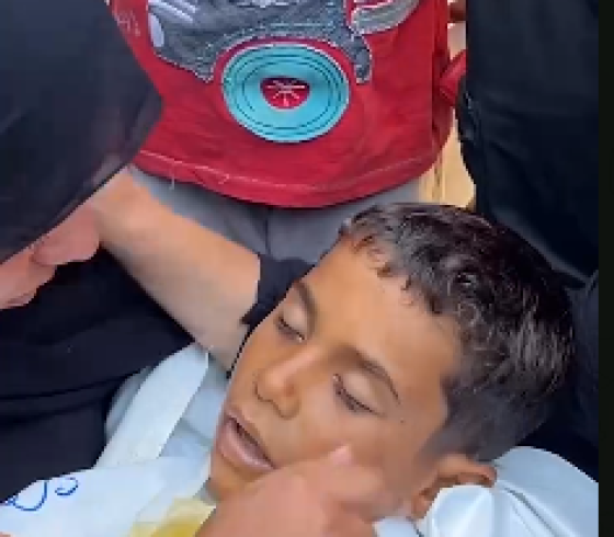 وداع الطفل الشهيد.PNG