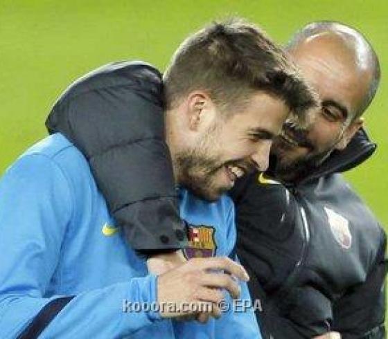 بيكي ومدرب برشلونة