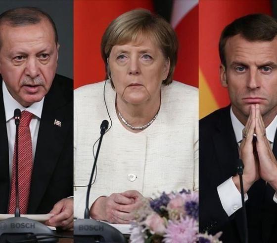 الرئيس التركي رجب طيب أردوغان ونظيره الفرنسي إيمانويل ماكرون والمستشارة الألمانية أنجيلا ميركل