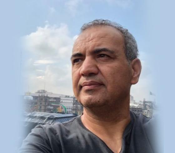 رسام الكاريكاتير المعروف عماد حجاج