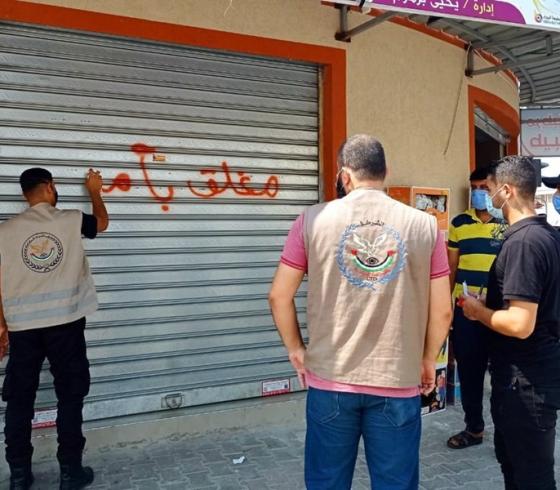 مباحث كورونا تغلق محال تجارية لمخالفتهم اجراءات السلامة