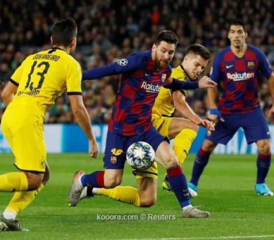 ليونيل ميسي نجم برشلونة وسط لاعبين من بروسيا دورتموند