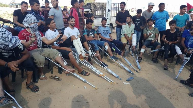 مصابون يشاركون في مسيرة الوفاء للجرحى شرق غزة