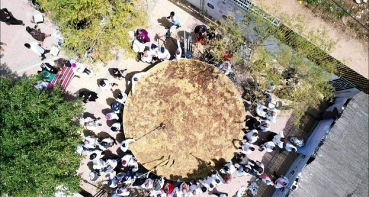 فلسطين تدخل موسوعة "غينيس" بأكبر طبق "مجدرة"