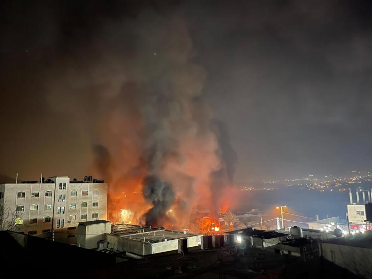 حرق المستوطنين بلدة حوارة.jpg