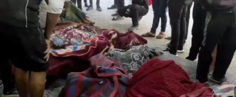 جثامين شهداء- مجزرة.JPG