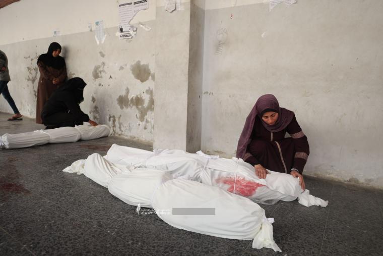 وداع شهداء عائلة النجار بالمستشفى الأهلى بغزة (8).jpeg