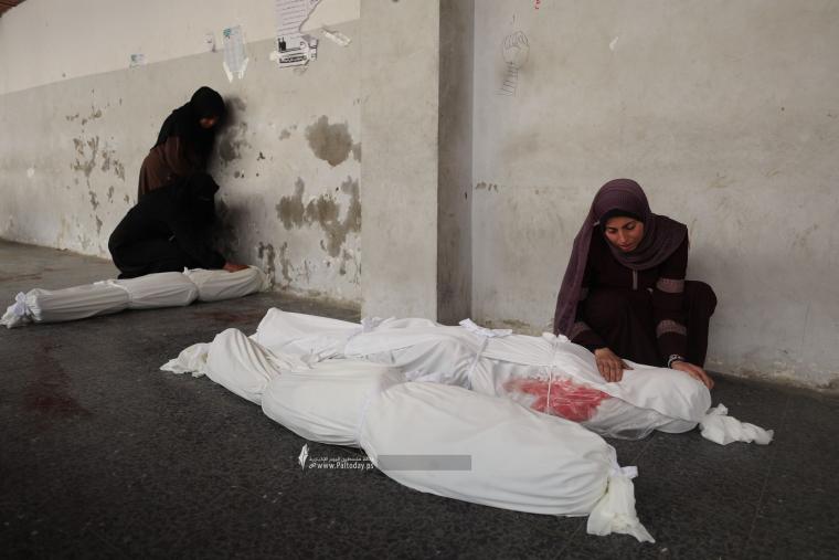 وداع شهداء عائلة النجار بالمستشفى الأهلى بغزة (9).jpeg