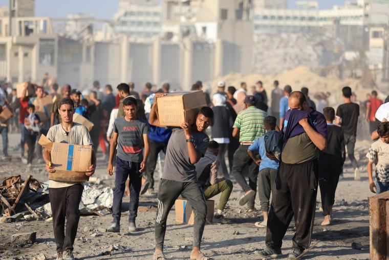 دخول المساعدات الغذائية عبر شارع الرشيد من بوابة زيكيم (9).JPG