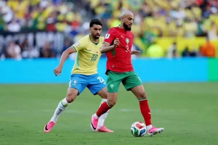 لاعبا المغرب والبرازيل