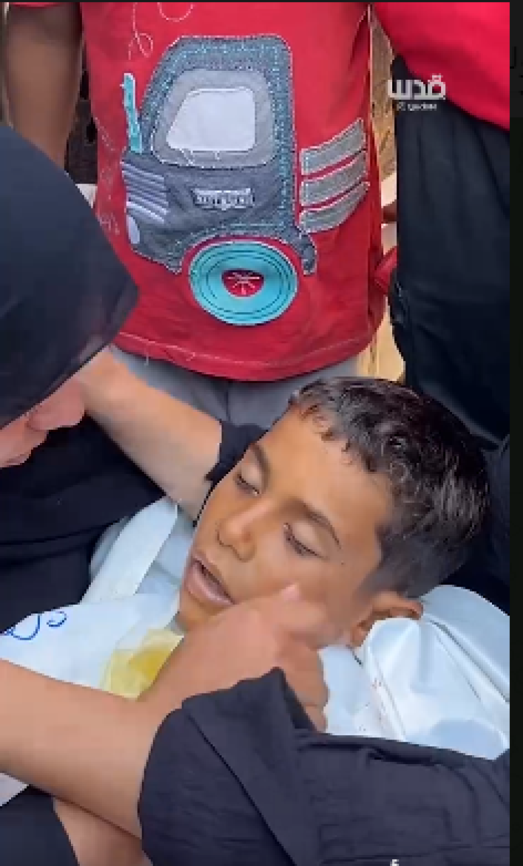 وداع الطفل الشهيد.PNG