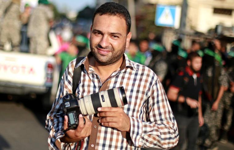 المصور أشرف ابو عمرة الفائز بالجائزة الدولية