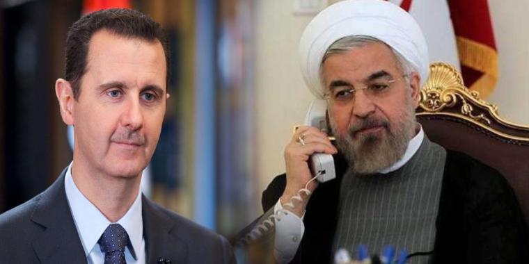 الرئيس السوري بشار الأسد ونظيره الإيراني حسن روحاني