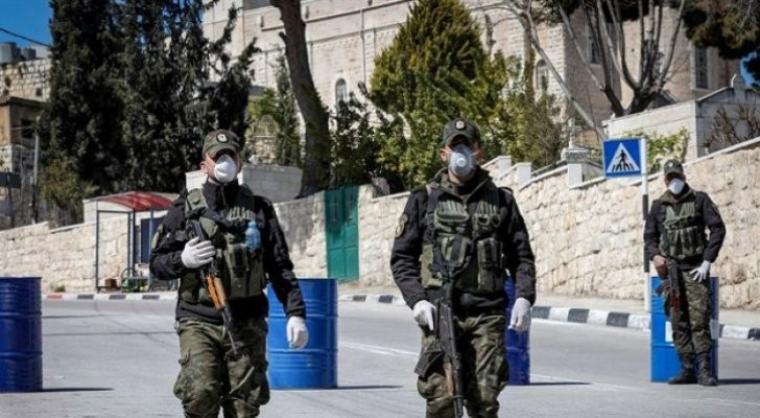 الشرطة الفلسطينية في  مواجهة كورونا