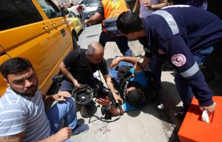 أحد اعتداءات الاحتلال على الصحفيين