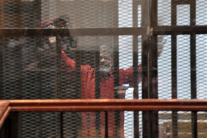 اول ظهور لمرسي بالبدلة الحمراء